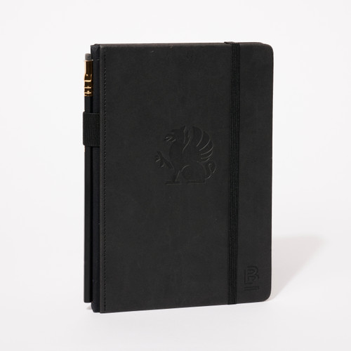 Vertical black notebook with debossed imprint of griffin artwork with black elastic closure at right side and pencil in holster on left side