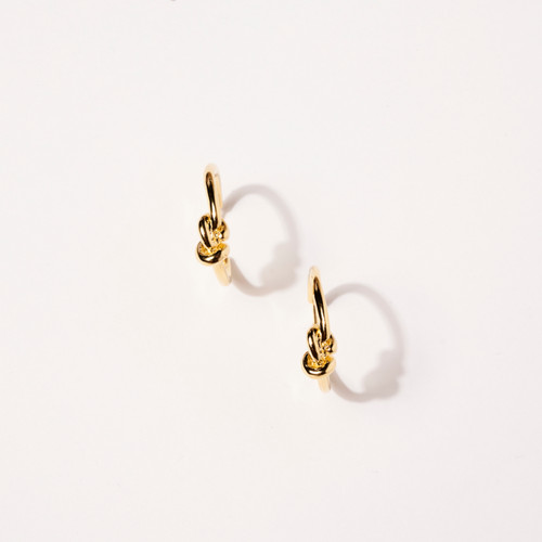 Front view of pair of gold-tone wire hoop earrings