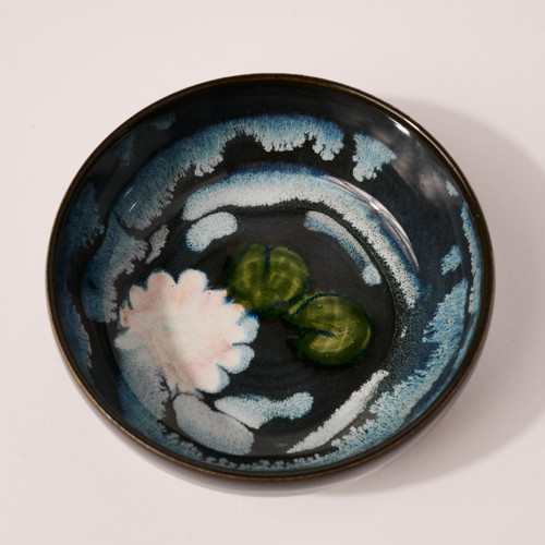 Aerial view of the dish featuring hand painted waterlilies.