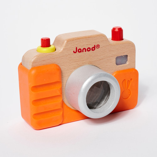 Front view of a wooden toy camera in an orange carrying case with red and yellow buttons