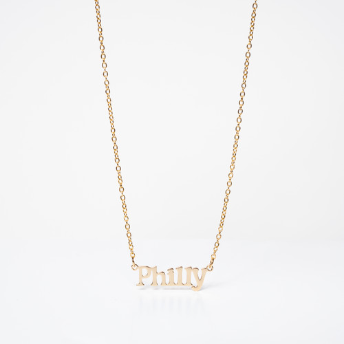 Gold-toned die-cut 'Philly' necklace with gold-toned chains from each side