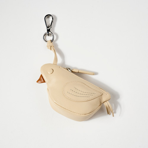 Beige leather wallet shaped like a dimensional bird with silver tone hook for attaching to purses, back packs, etc