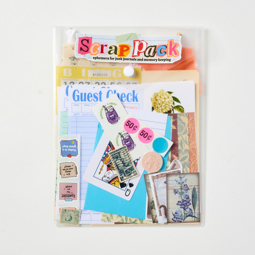 A plastic folio called a "Scrap Pack", with a variety of scrapbooking ephemera such as stamps, bingo cards, vintage stickers, sheet music, and gauzy fabric.