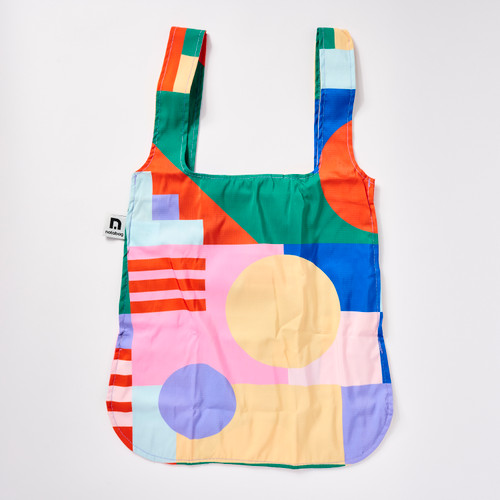 Front view of a colorful, geometric printed tote bag.