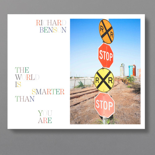 Front cover of "Richard Benson The World Is Smarter Than You Are", which shows a photograph of American road signs and the book's title in rainbow colors.