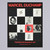 A black, white, and red postcard featuring an exhibition poster design and images of artwork by Marcel Duchamp.