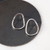 Pair of Sterling Large Circle Studs by Niki Leist; sterling rod bent into a free-form circle