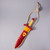 Image of a wooden sword with a yellow handle inside it's red and yellow felt holder with dragon detail. The pouch has a knotted rope strap.
