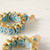 Blue Two-Tone Hoop Quilled Paper Earrings by Julie Pierre