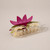 Front of Twin Rabbits Acetate Hair Clip with purplish pink 4 pointed flower above a clear semi-circled hair clip with 2 rabbits printed in white facing each other showing 'teeth' of clip opposite spring clasp