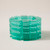 Stretch bracelet made from transparent aqua stacked laser-cut acrylic 'BOOM' cut outs