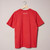 Back of red t-shirt showing ROBERT INDIANA printed in white at the top of shirt