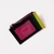 Reverse side of multicolor wallet of dark green, pink and brown with zippered side pocket and transparent ID window