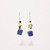 Pair of long dangle earrings consisting of a  small and tiny cubes and beads of blue and green suspended on wire