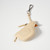 Beige leather wallet shaped like a dimensional bird facing to the right with silver tone hook for attaching to purses, back packs, etc