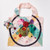 Front view of a reusable tote bag with a full-bleed design of Wassily Kandinsky’s “Circles in a Circle" painting and a matching square zip pouch.