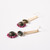 Close up view of the earrings.