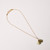 Full view of the necklace laid flat.