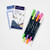 Top view of the markers arranged neatly next to a blank swatch card and another example of a drawing created with the markers.
