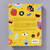 The back cover of Sketch Book Challenge shows a collection of colorful illustrations of people, fruit, leaves, flowers, and other items arranged around a description of the book in black text on a yellow background.