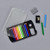 The mini color pencil set is shown flat on a grey surface. The plastic protective sleeve is featured to the side. In view and placed inside the packaging are 10 colored pencils. Two mini pencils, plus the grey eraser and the sharpener, are shown to the side.