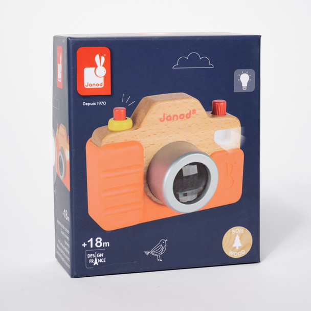Front view of the toy camera's packaging- a navy box showing the image of the camera