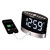 Image: Low vision clock radio with wireless vibrating alarm, with a phone plugged in to charge