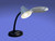 big eye desk lamp, attached lens, blue backgroun