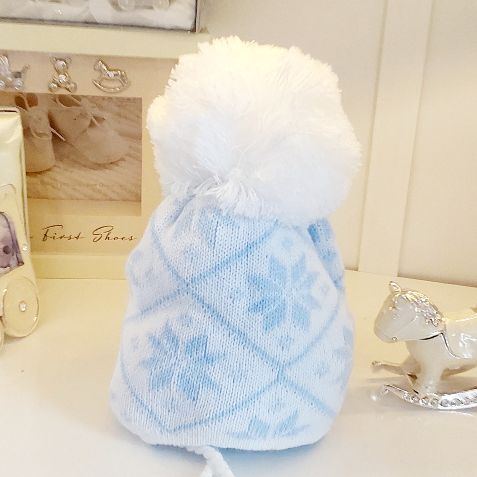 Kinder Knitted White Snowflake Pom Pom Hat with Ties”