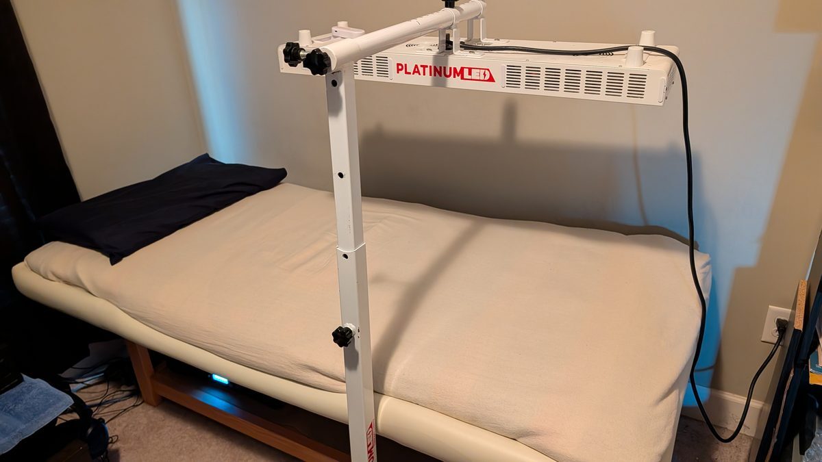 PlatinumLED red light panel positioned over an InnerSoul Liquid Sound Table