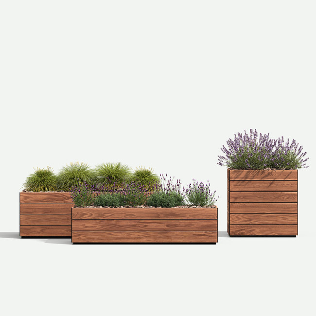 [STATIC] Boulevard Rectangle Wood Planter with thermally modified wood cladding and fiberglass liner in a commercial outdoor setting.
