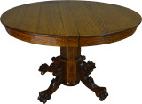 SOLD Round Oak Lion Head and Claw Foot Dining Table with 2 Leaves