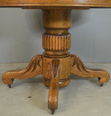 SOLD Victorian Round Oak Carved Dining Table – 2 Leaves