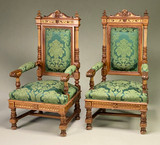 SOLD AN EXQUISITE PAIR OF RENAISSANCE REVIVAL CARVED WALNUT ARMCHAIRS