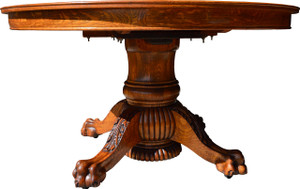 SOLD Round Oak 54” Heavily Carved Banquet Table by Hastings – 4 Leaves