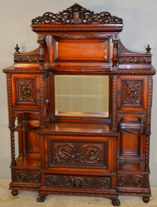 SOLD  Mahogany Herter Style Heavily Carved Etagere