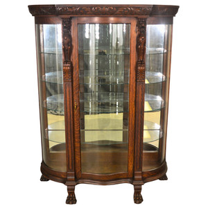 SOLD Antique Large Carved Lion Body Curved Glass China Closet