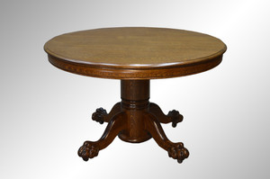 SOLD Antique Round Oak Claw Foot Dining Table -4 Feet – 2 leaves