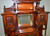 SOLD  Mahogany Herter Style Heavily Carved Etagere