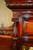 SOLD  Mahogany Herter Style Heavily Carved Etagere