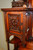 SOLD  Mahogany Herter Style Heavily Carved Etagere