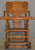 SOLD Antique Children’s Heavily Carved Up and Down High Chair Stroller Oak