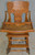 SOLD Antique Children’s Heavily Carved Up and Down High Chair Stroller Oak