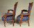 SOLD PAIR OF AESTHETIC MOVEMENT CARVED WALNUT ARMCHAIRS