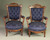 SOLD PAIR OF AESTHETIC MOVEMENT CARVED WALNUT ARMCHAIRS