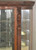 SOLD Antique Large Carved Lion Body Curved Glass China Closet