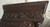 SOLD Antique Excessive Carved Multiple Bodies and Faces Walnut China Closet
