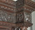 SOLD Antique Excessive Carved Multiple Bodies and Faces Walnut China Closet