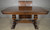 SOLD Antique Carved Pillar Dining Table with 2 Leaves