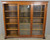 SOLD Antique 1890s Oak Triple Door Bookcase with Angel Heads and Claw Feet